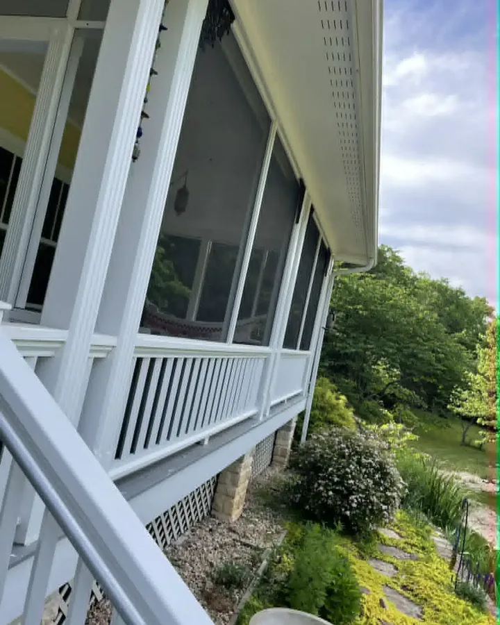 Screened porch and railings on a Northwest Arkansas home